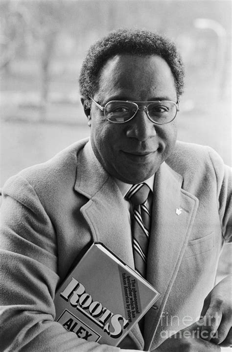 Alex Haley Carrying A Copy Of Roots Photograph By Bettmann Fine Art