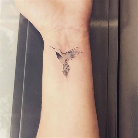 Fine Line Hummingbird Tattoo On The Wrist