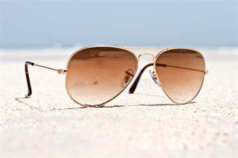 Sunglasses On A Sand Beach Stock Image Image Of Sunglasses 41844291