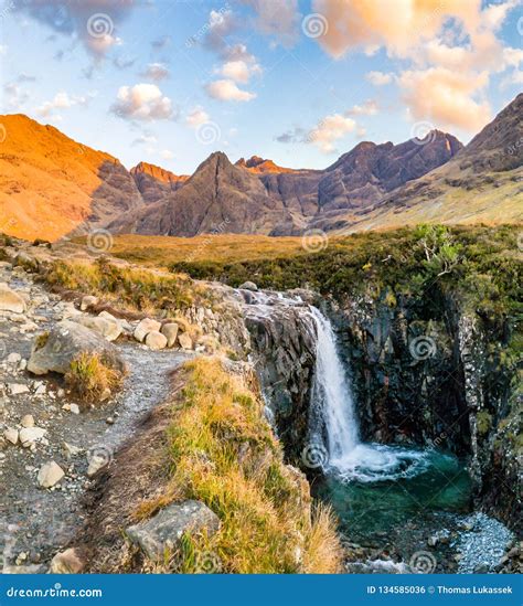 The Fairy Pools In Front Of The Black Cuillin Mountains On The Isle Of