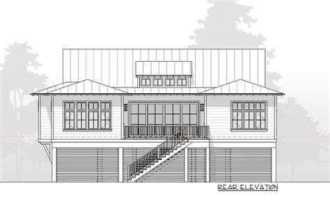 3 4 Bedroom Beach House Plan With Drive Under Garage 970093vc