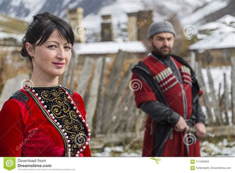 Georgian Young Couple In Their Traditional Local Costumes In Ushguli ...