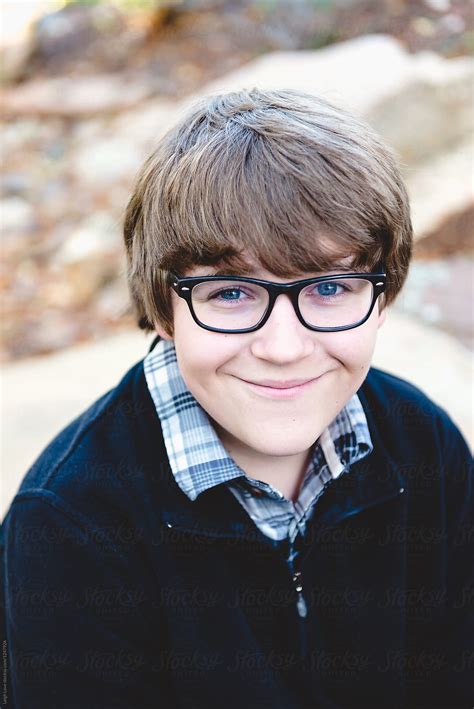 Brown Haired Teen Boy With Glasses Poses For Portrait By Leigh Love
