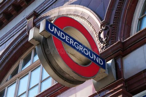 A Close Up Of A London Underground Sign Outside A Tube Station In