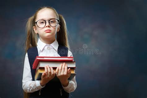 Serious Schoolgirl Wear Glasses Hold Pile Of Book Stock Image Image