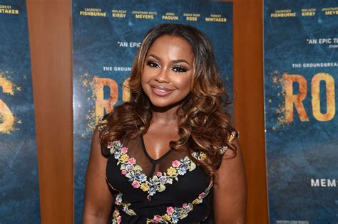 Phaedra Parks Shows Off Her Generous Curves In This Blue Skin Tight