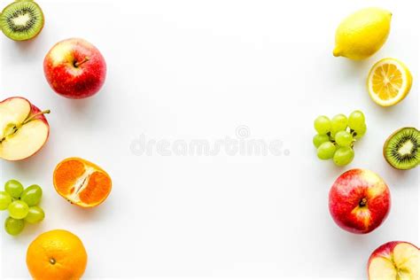 Oranges Lemon Apple Kiwi And Grape Healthy Food Concept With