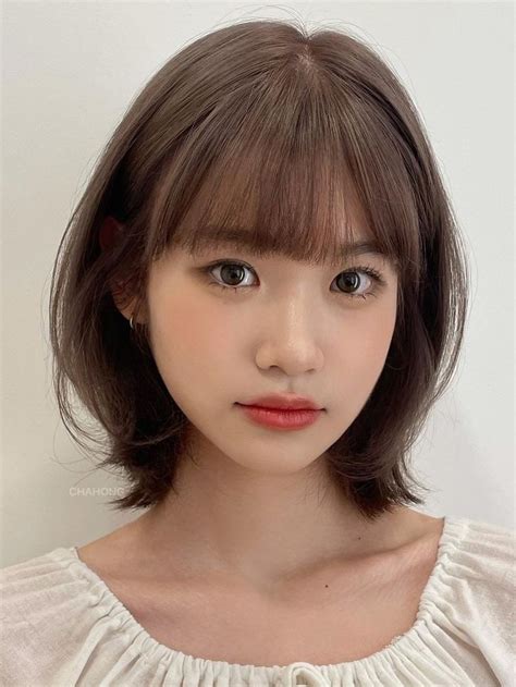 korean short layered hairstyle with front bangs short haircuts with bangs layered hair with