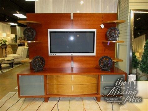 Contemporary Entertainment Center In A Medium Finish There Are Three