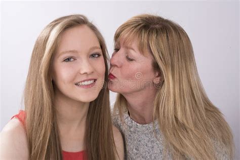Loving Teenage Daughter Kissing Smiling Her Mother Stock Photos Free Royalty Free Stock
