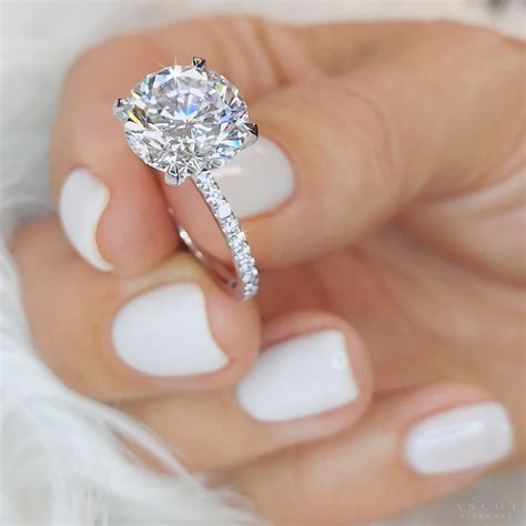 By angeline raw diamond engagement ring, $1,595, byangeline.com. 2.5 ct Round Cut Diamond Solitaire Ring - Ascot Diamonds