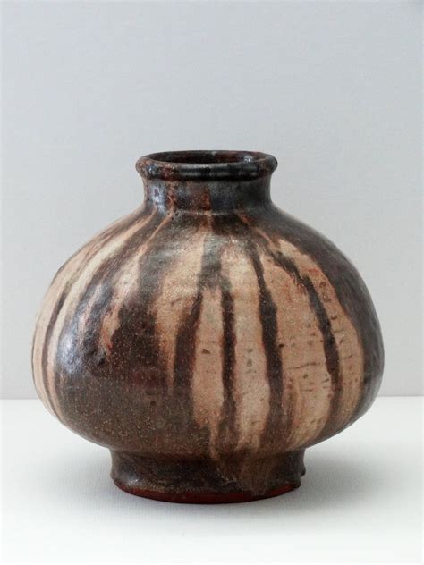 The most common ceramic heater material is ceramic. Karlsruhe Majolika Mid Century Brown Beige & Pink West ...