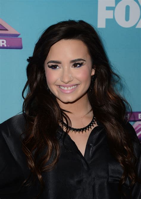 DEMI LOVATO at The X Factor Season Finale News Conference in Los Angeles - HawtCelebs