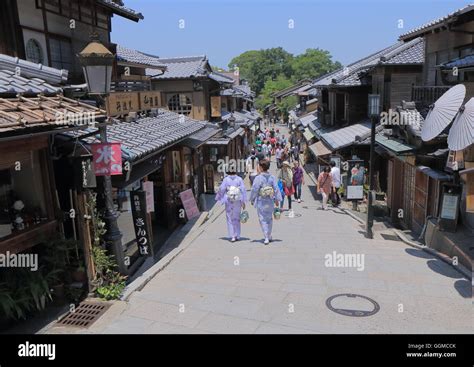 People Stroll Ninenzaka Street In Higashiyama Kyoto Japan Stock Photo
