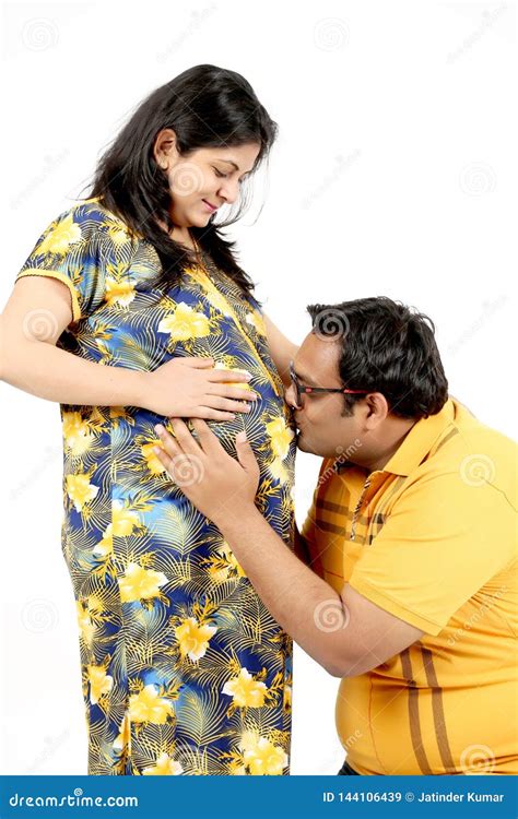 Man Is Kissing The Belly Of His Pregnant Wife Stock Image Image Of