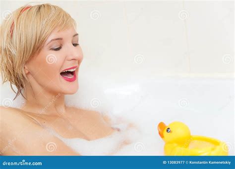 Smiling Blond Woman Lying In Bubble Bath Stock Image Image Of