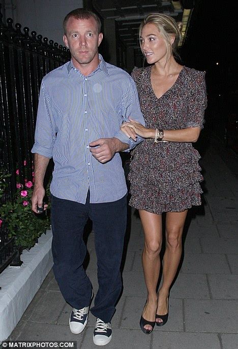 guy ritchie s new girlfriend jacqui ainsley looks smitten pity the director couldn t raise a