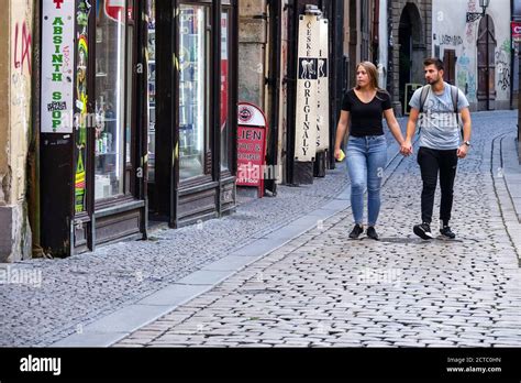 prague street in old town jilska street couple walking in an empty cobbled street cobblestone