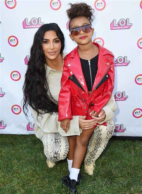 North West Makes Runway Debut Mom Kim Kardashian Cheers Her On