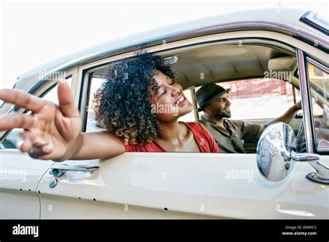 Couple Driving In Vintage Car Stock Photo Alamy