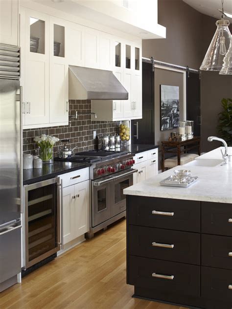 This was followed by wood grain cabinets which held 25. Oak Cabinets Black Countertops | Houzz