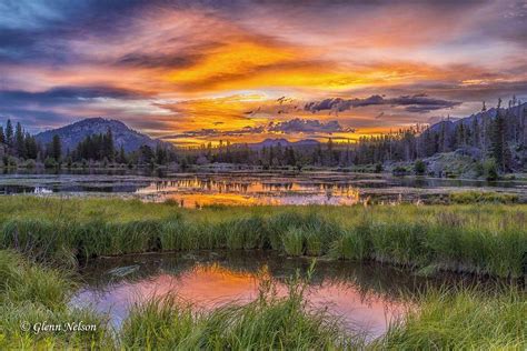 The Sun Rises Over Sprague Lake In Rocky Mountain National