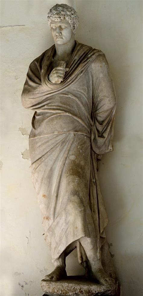 A Portrait Of A Roman In Toga With A Head From A Different Statue