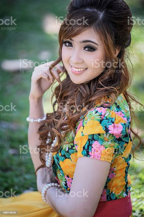 Asia Beautiful Girl In The Yellow Dress Stock Photo Download Image