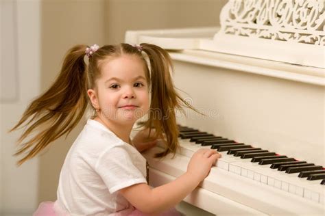 4002 Beautiful Girl Playing Piano Stock Photos Free And Royalty Free