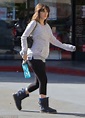 Pregnant Zooey Deschanel displays her baby bump in a casual jumper and leggings as she keeps up ...