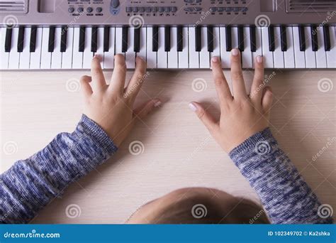 Beautiful Girls Hands Playing Electronic Piano Keyboards Stock Photo