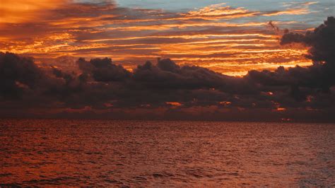 Download Wallpaper 3840x2160 Sea Horizon Clouds Sunset Sky Ripples