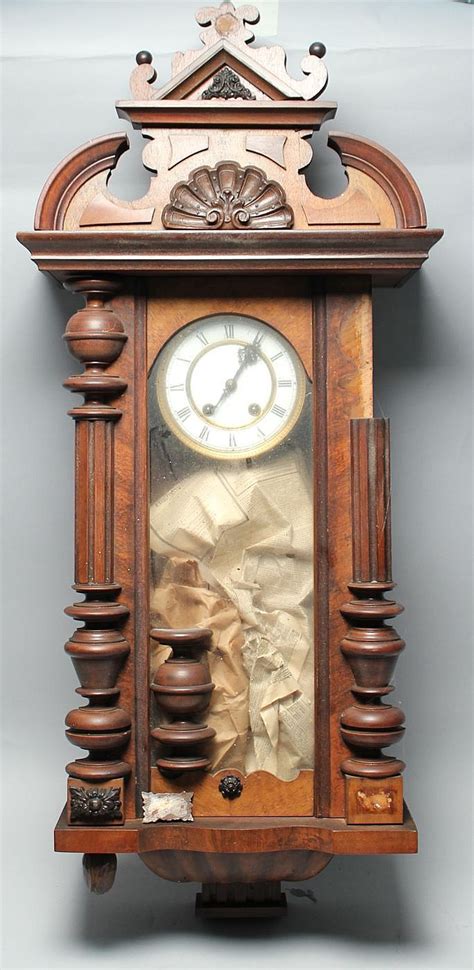 Lot Cased Regulator Wall Clock In Walnut With Turned And Carved