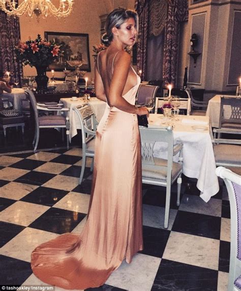 Natasha Oakley Reveals A Hint Of Side Boob In Backless Evening Gown
