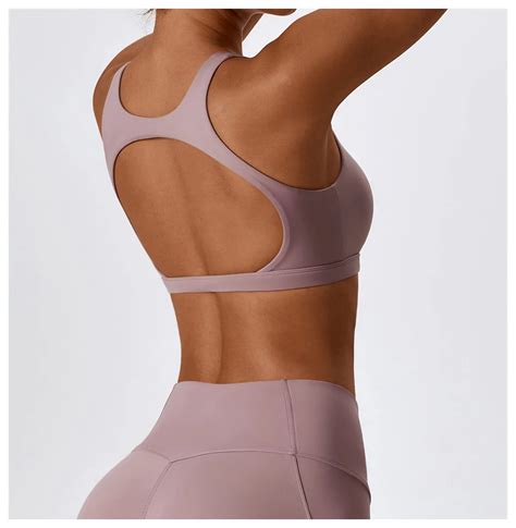 Hot Selling Nude Soft Shockproof Gathering Push Up Wear Women Fitness