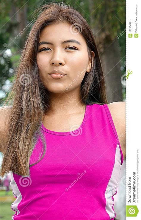 Beautiful Teen Female Making Funny Faces Pink Stock Image