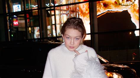 Gigi Hadid Has A Dazzling Winter White Style Moment After Dark In New