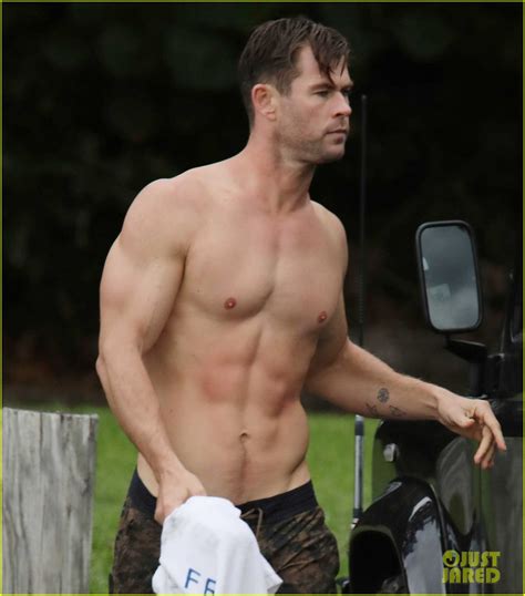 Chris Hemsworth Bares Incredible Body While Shirtless After Surfing