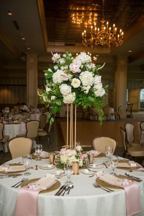 reception table tall centerpiece short and submerged flower vase tall centerpieces tall