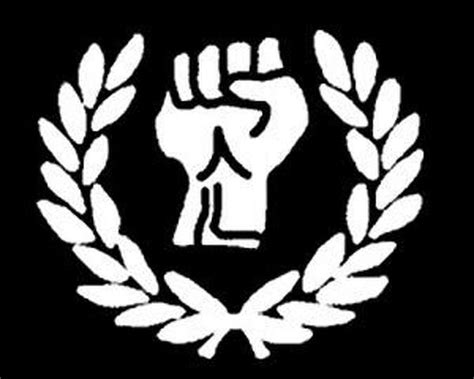 White Power Fist With Laurels Symbol Worn By Some Racist Photo