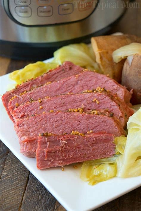 Place corned beef in instant pot, fatty side down and add beef broth and crushed garlic. Easy Instant Pot Corned Beef and Cabbage Recipe + Video
