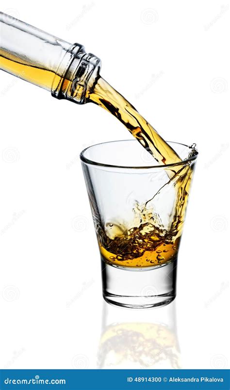 Whiskey Being Poured Into A Glass Stock Photo Image Of Cognac Gold