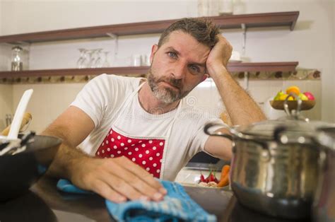 Domestic Chores Lifestyle Portrait Of Young Tired And Stressed Asian