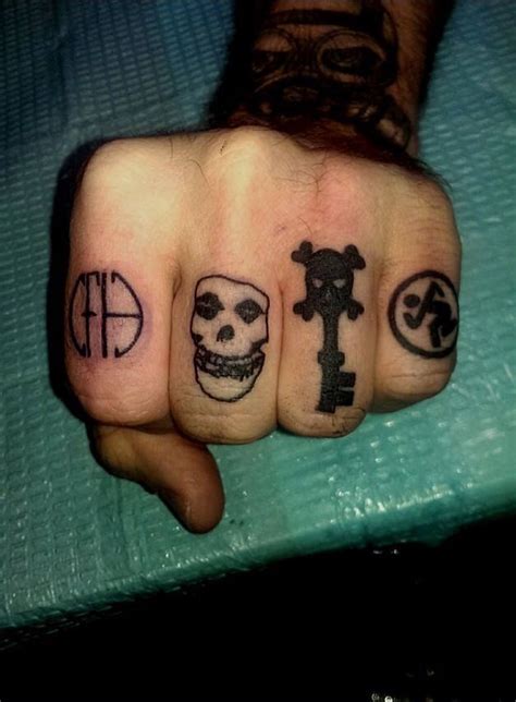 Knuckle Tattoos By Audrey Mello