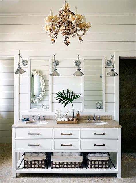 For this bathroom, it has blue walls and wooden features seen on the cabinet and vanity. 25 Mesmerizing Coastal Interiors with Tropical Elements ...