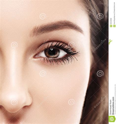 Beautiful Woman Eyes And Nose Half Face Studio On White