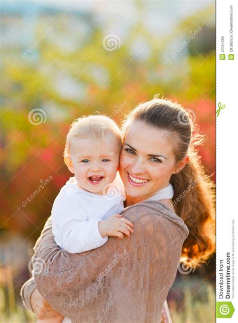 Happy Mother With Smiling Baby On Street Royalty Free Stock Image 