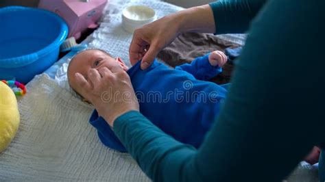 Baby Boy Getting Dressed By His Mother Stock Footage Video Of Hands