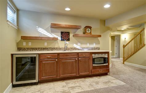 Deciding how you will use your basement will determine how you approach design. Basement Walk-Up Bar - Traditional - Basement - denver ...