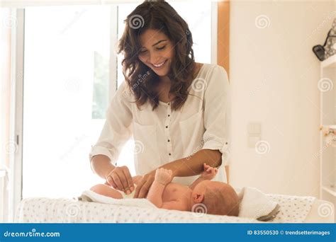 Mother Changing Baby S Diaper Stock Photo Image Of White Skin 83550530